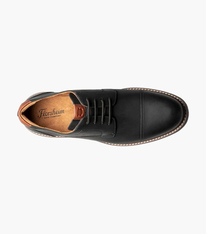 Florsheim Norwalk Cap Toe Oxford dress shoe in black leather with brown lining and stitched sole, top view showing lace system.