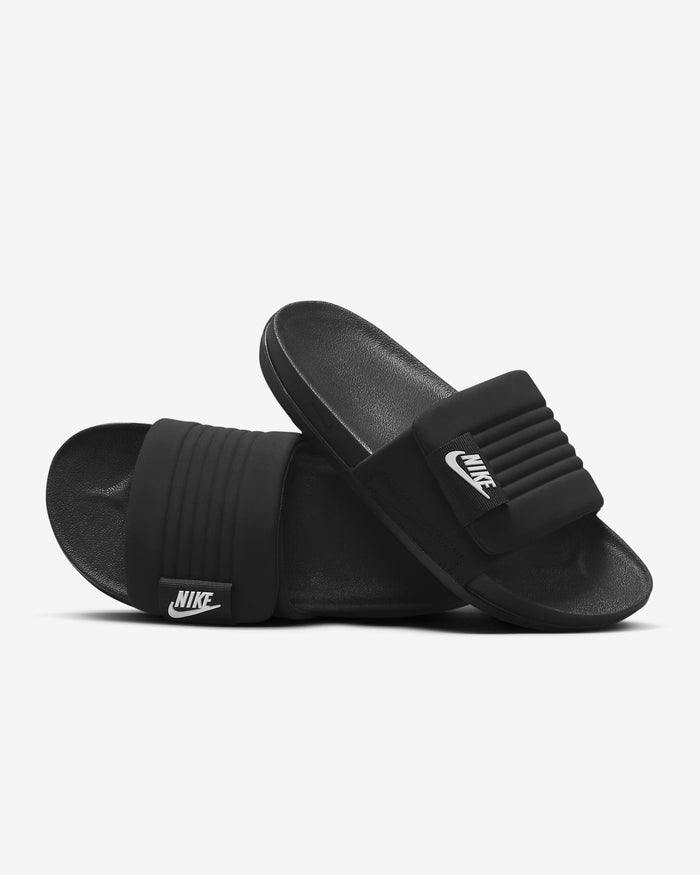Nike Offcourt Adjustable Slide sandals in black with padded strap and white logo, angled side view displaying textured sole.