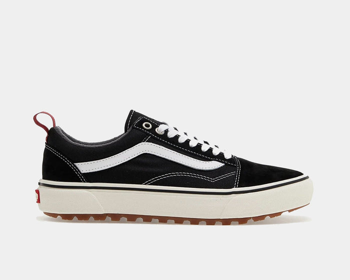 Vans Old Skool MTE sneakers in black with white sidestripe, suede and canvas upper, rugged gum outsole, side view.