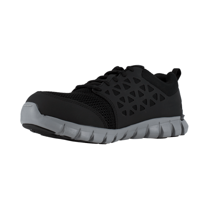 Reebok Work Sublite Cushion Work shoes in black with mesh upper and gray cushioned sole, front-angle view.