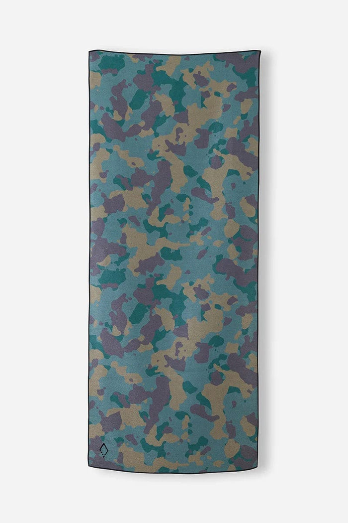 Nomadix Original Towel featuring a multicolor camouflage pattern in teal, tan, and dark green, full front view.