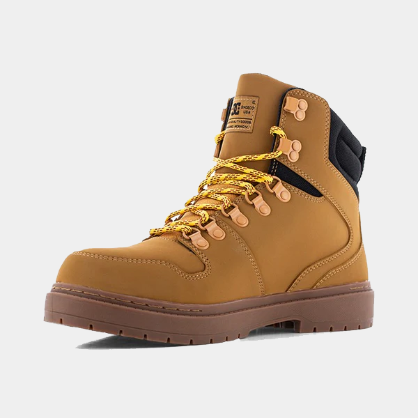DC WorkCrew Peary TR Work Waterproof Comp Toe Boot in tan leather with yellow laces and black padded collar, side angle view.