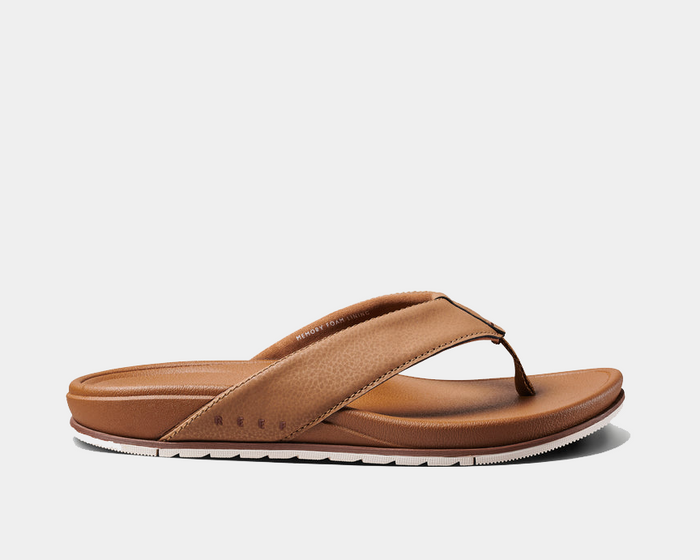 Reef Phantom Bronzer sandals with brown faux leather straps, cushioned footbed, and textured white outsole, side view.