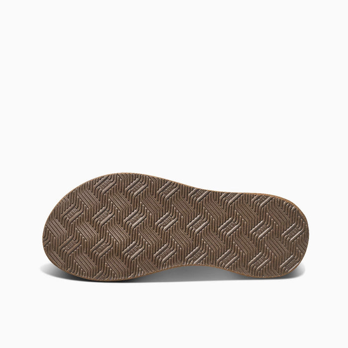 Reef Phantom II sandals outsole showing textured tread pattern in brown rubber, bottom view.