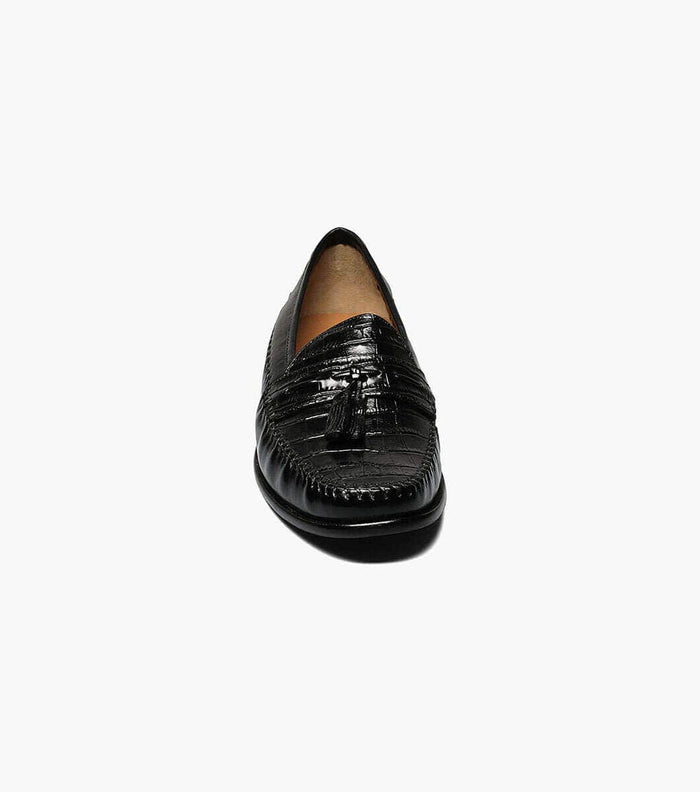 Florsheim Pisa loafer in black with crocodile-patterned leather and tassel detail, front view.