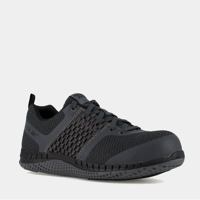 Reebok Work Print Work ULTK work shoes in dark gray with woven mesh upper and reinforced toe cap, front angled view.