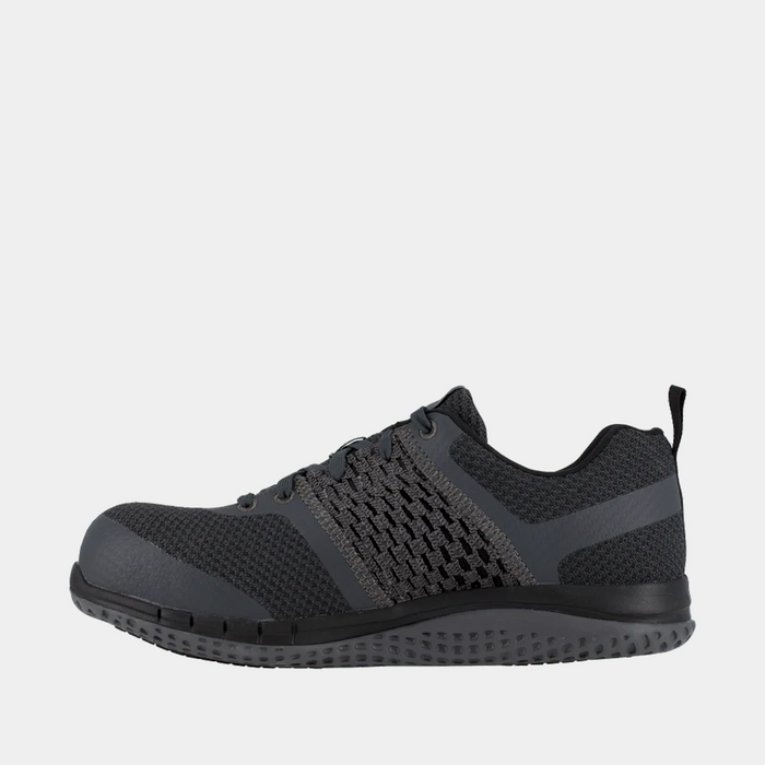 Reebok Work Print Work ULTK work shoes in charcoal gray with knit mesh upper and slip-resistant sole, side view.