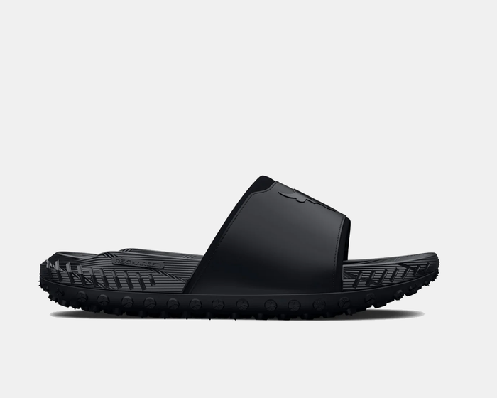 Under Armour Project Rock 3 Slides in black featuring textured strap, rugged outsole, and embossed logo, side view.