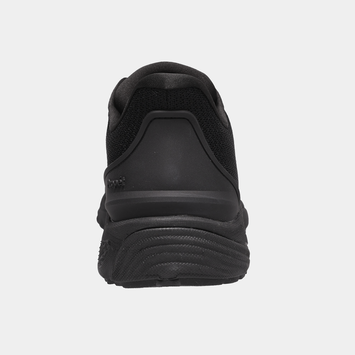 Propét One Velocity Step-In Sneaker in black mesh and synthetic materials with cushioned heel, back view showing textured sole.