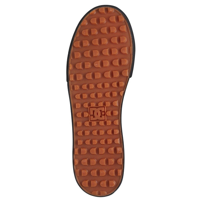 DC Footwear Pure High Top WC Winter shoes outsole in durable textured orange rubber featuring brand logo and grip-enhancing tread pattern.