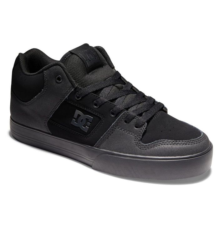DC Footwear Pure Mid sneakers in black with suede and leather upper, padded collar, and lace-up closure, side angle view.