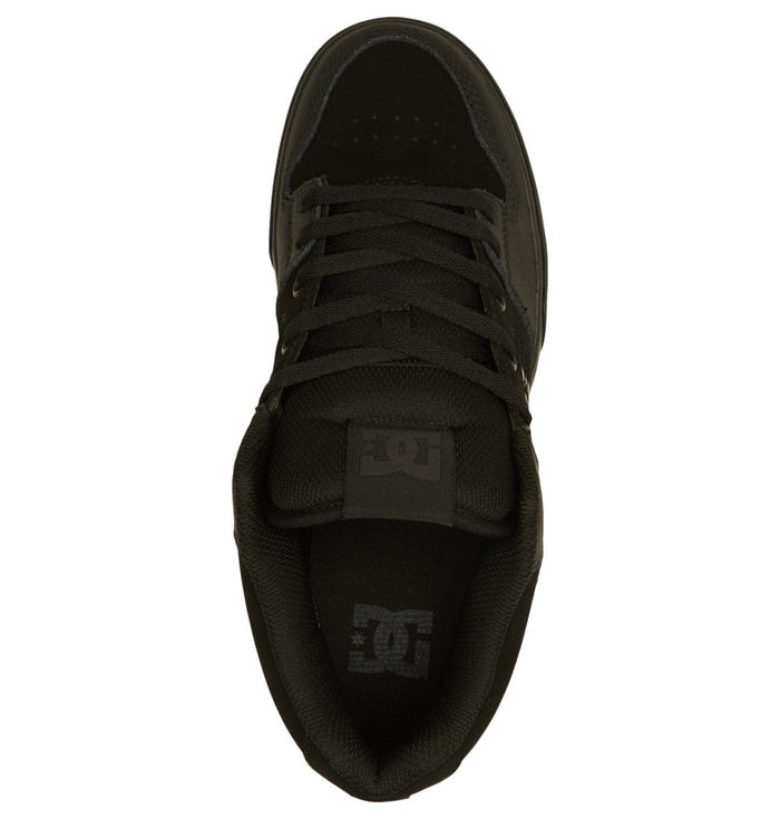 DC Footwear Pure Mid sneakers in black with padded tongue and lace-up closure, top view showing logo detail.