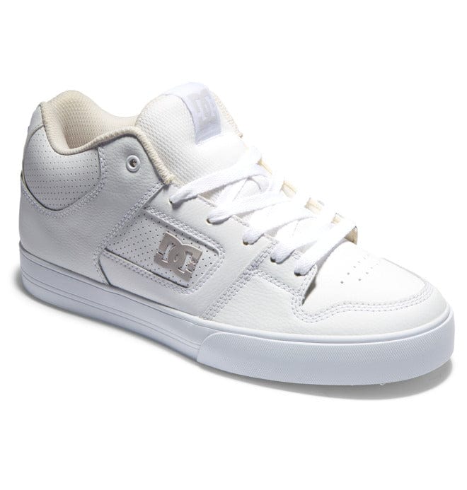 DC Footwear Pure Mid sneakers in all-white featuring a mid-top design, perforated leather upper, and padded collar, side view.
