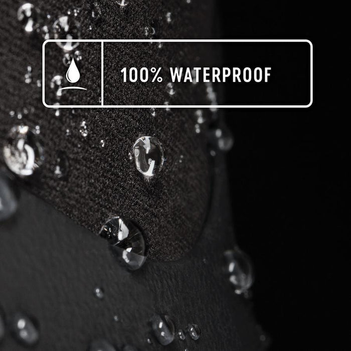 Bogs Rancher waterproof boots close-up showing water-resistant black textured material with water droplets.