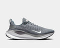 Nike React Infinity Run 4 running shoes in gray with breathable mesh upper, React foam midsole, and side profile showing swoosh logo.