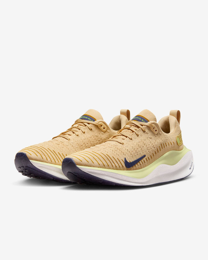 Nike React Infinity Run Flyknit 4 running shoes in tan with breathable Flyknit upper, navy accents, and cushioned React midsole, front angle.