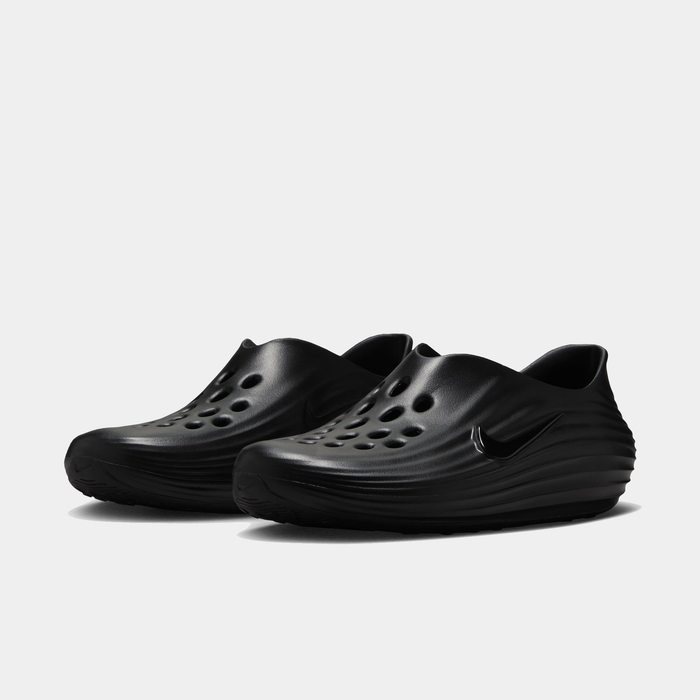 Nike ReactX Rejuven8 clogs in black with perforated upper, sculpted design, and subtle Nike swoosh logo, front angle view.