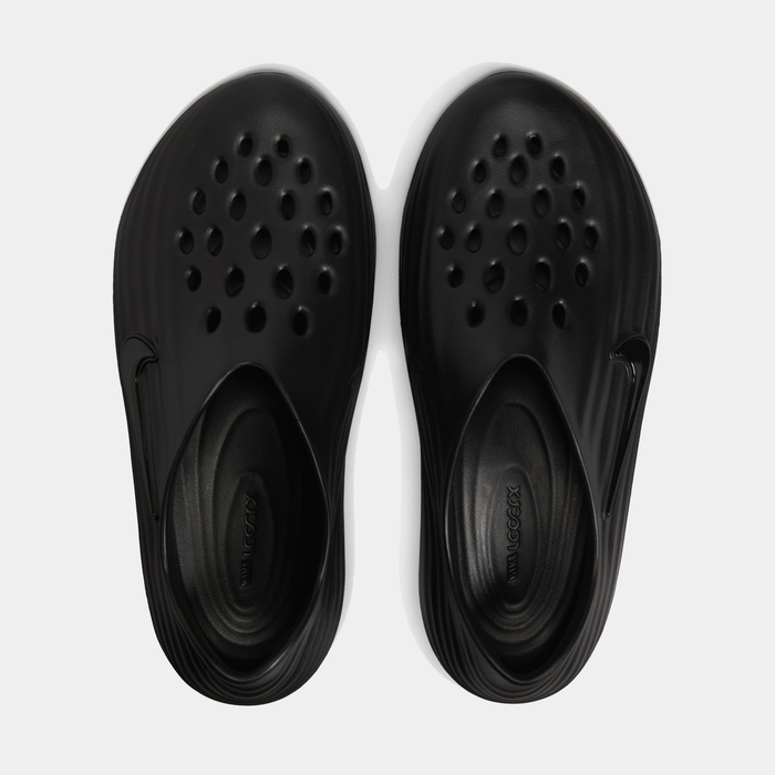 Nike ReactX Rejuven8 slip-on shoes in black with perforated upper for breathability and ergonomic footbed, top view.