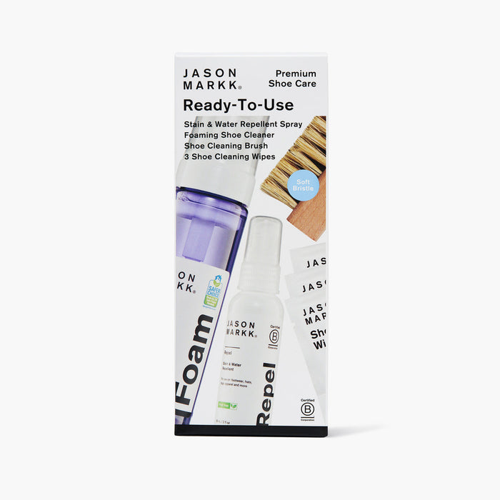 Jason Markk Ready-To-Use Clean Kit featuring stain and water repellent spray, foaming shoe cleaner, soft-bristle cleaning brush, and three shoe cleaning wipes, front packaging view.