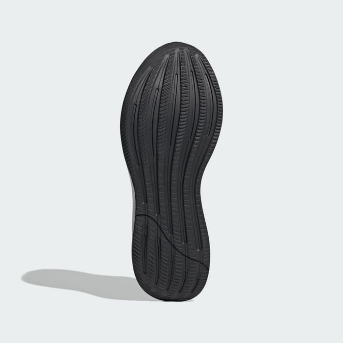Adidas Response running shoes sole view featuring black rubber outsole with curved tread pattern for traction and flexibility.