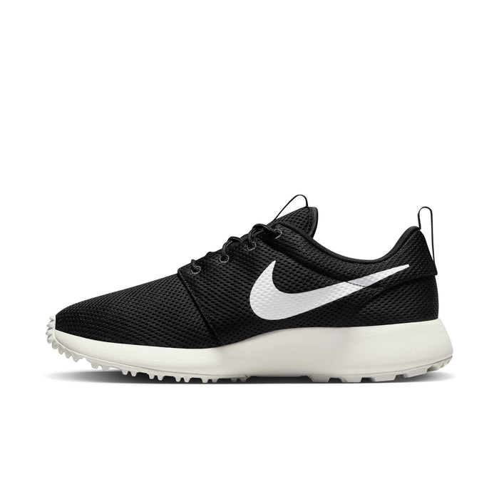 Nike Roshe Golf Next Nature shoes in black mesh upper with white sole and white Nike Swoosh logo, side view.