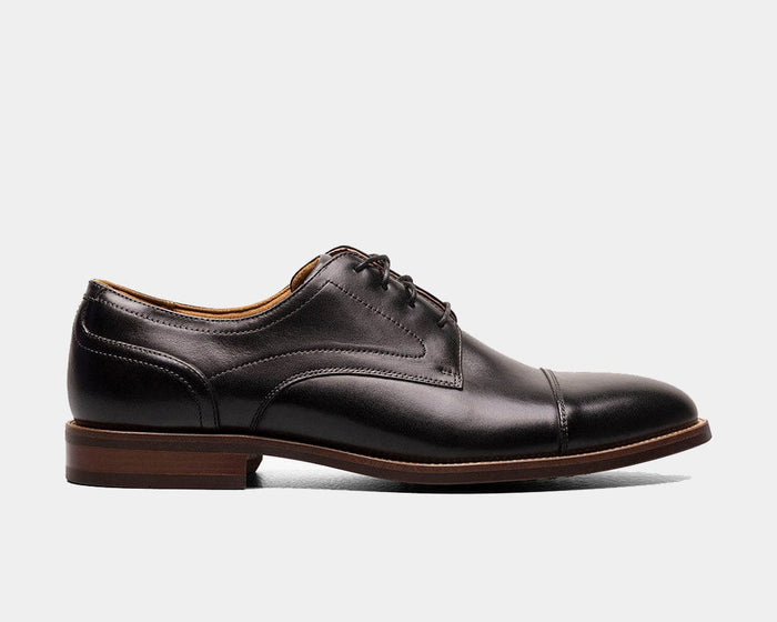 Florsheim Rucci Cap Oxford dress shoes in dark brown leather with cap toe and stacked heel, side view.