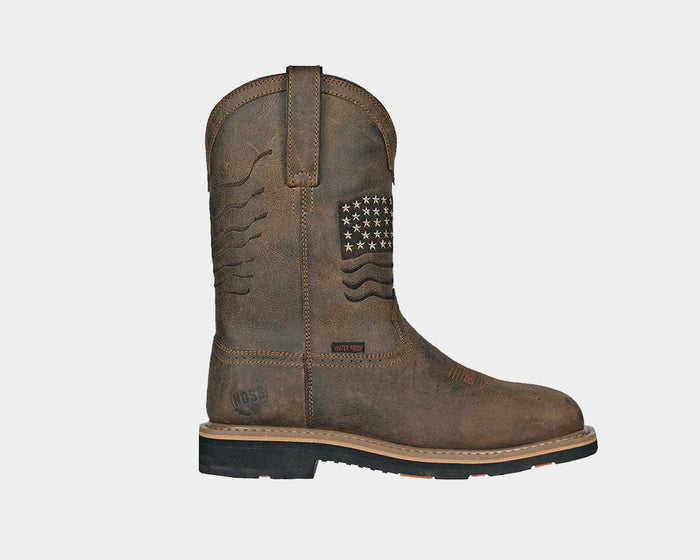 Hoss Rushmore Comp Toe Western Boot in distressed brown leather with American flag stitching detail and slip-resistant outsole, side view.