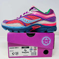 Saucony ProGrid Omni 9 pink and purple running shoe on purple box with size label