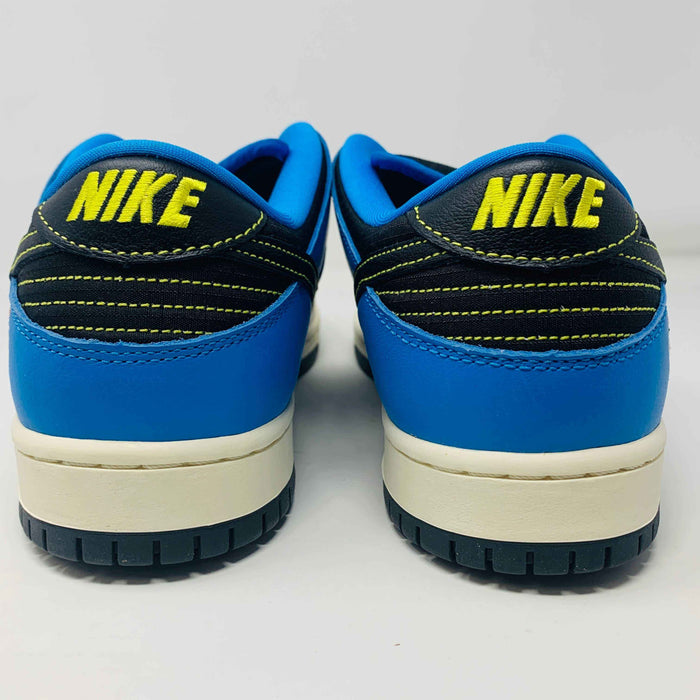 Nike SB Dunk Low Instant Skateboards shoes in blue with yellow Nike branding on the heel.