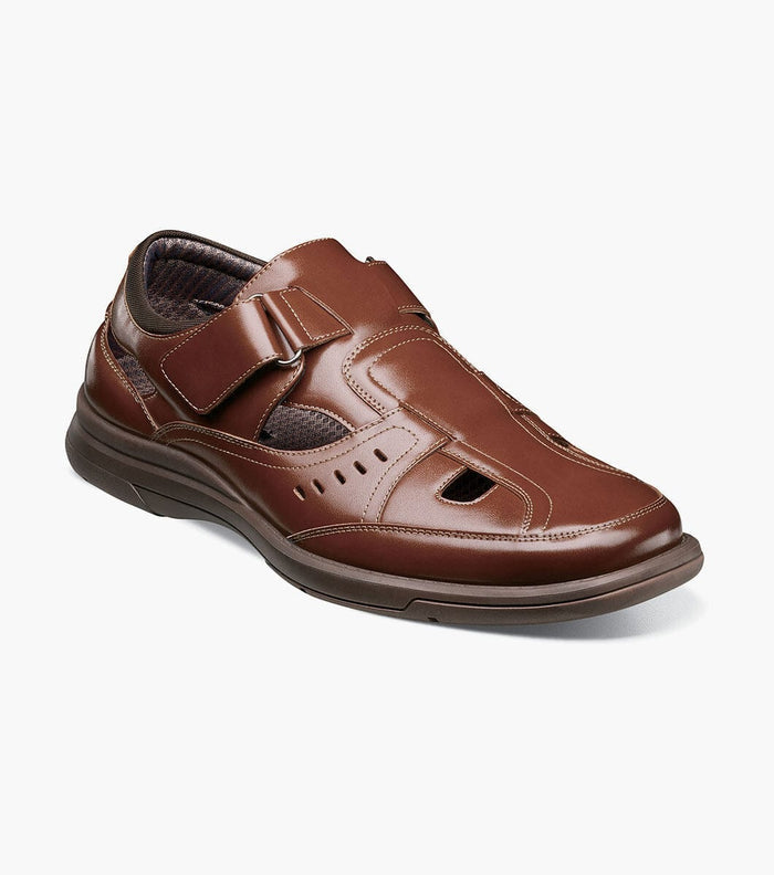 Stacy Adams Scully shoes in brown with perforated leather upper, adjustable strap closure, and cushioned sole, angled front view.