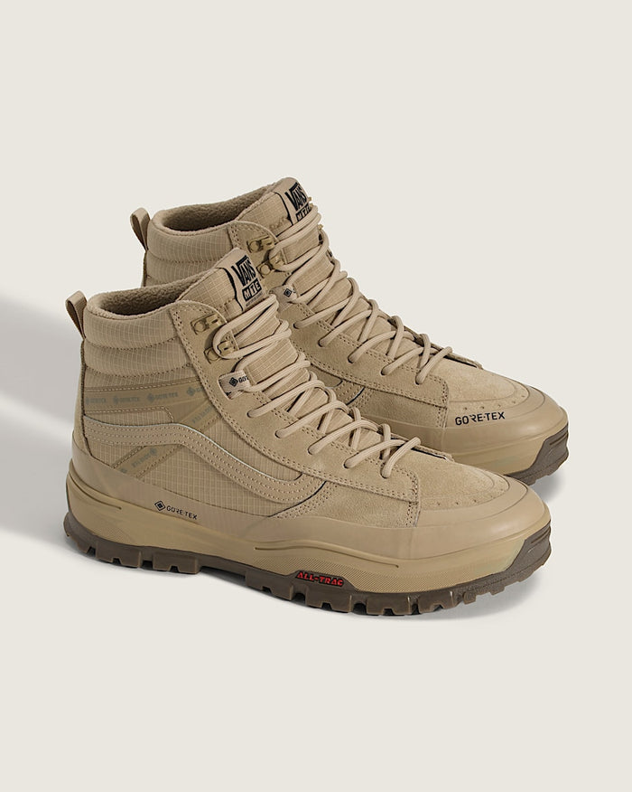 Vans Sk8-Hi GORE-TEX Insulated shoes in beige with ripstop material, GORE-TEX waterproofing, and rugged All-Trac outsoles, side view.