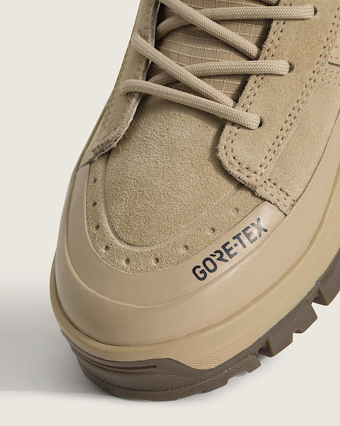 Vans Sk8-Hi GORE-TEX Insulated Shoe in beige with rugged suede upper, GORE-TEX branding, and durable traction sole, close-up of toe box.