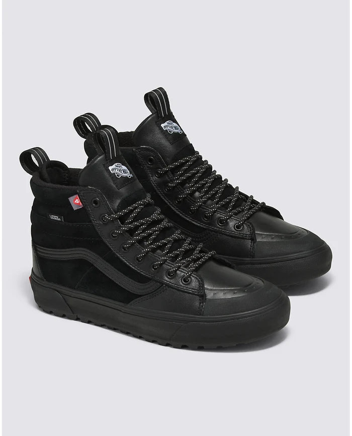 Vans Sk8-Hi MTE-2 high-top sneakers in black featuring rugged outsole, weather-resistant suede and leather upper, and reinforced toe box, angled front view.