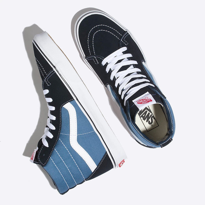 Vans Sk8-Hi shoes with navy and blue canvas uppers, white leather side stripe, white laces, and waffle sole, top and side view.