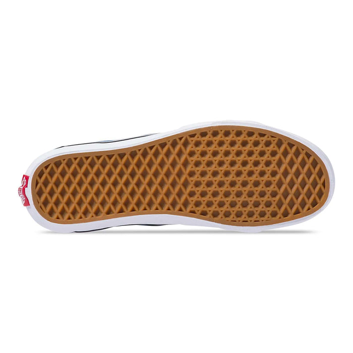 Vans Sk8-Hi sneakers outsole with waffle tread pattern in gum rubber and white midsole, bottom view.