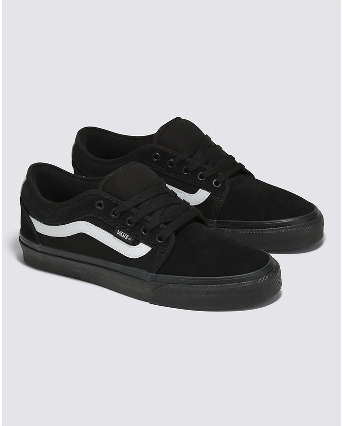 Vans Skate Chukka Low Sidestripe Core skate shoes in black suede with white sidestripe and durable black outsole, front side view.