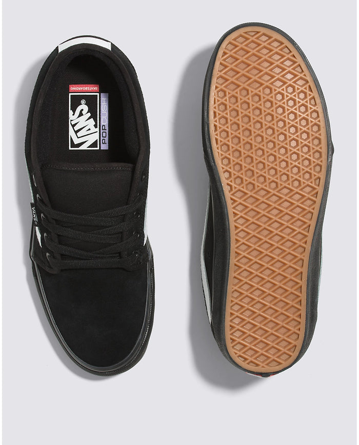 Vans Skate Chukka Low Sidestripe Core skate shoes in black with white sidestripe, gum waffle sole, top and outsole view.