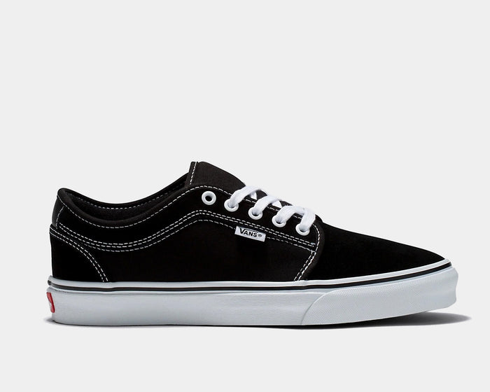 Vans Skate Chukka Low shoes side view, black suede and canvas upper with white stitching, laces, and vulcanized sole.