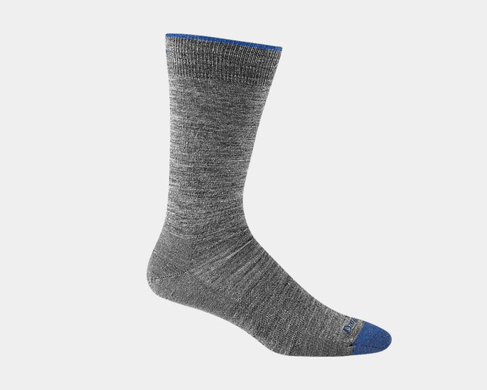 Darn Tough Solid Crew Light socks in gray with blue accents, featuring durable knit construction and lightweight design, side view.