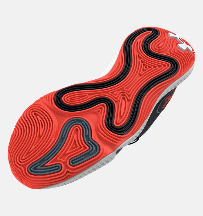 Under Armour Spawn 5 basketball shoes outsole featuring a vibrant red and black wavy traction pattern with white accents, sole view.