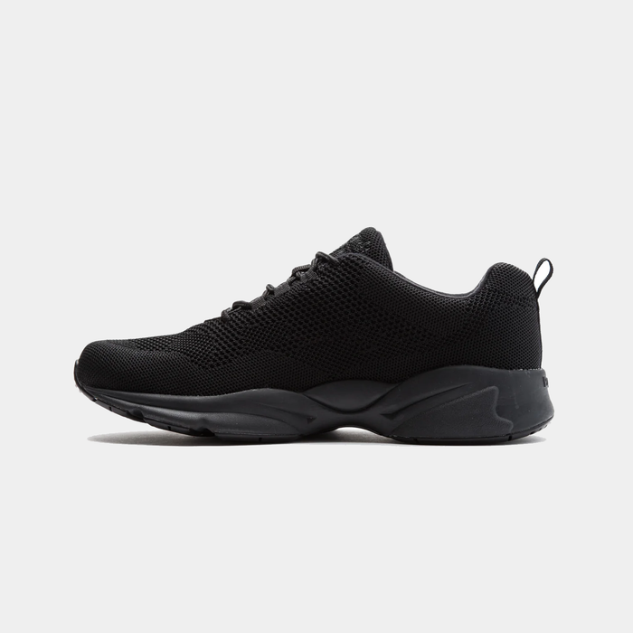 An all black sneaker with a knit mesh upper and a roomy toe box.