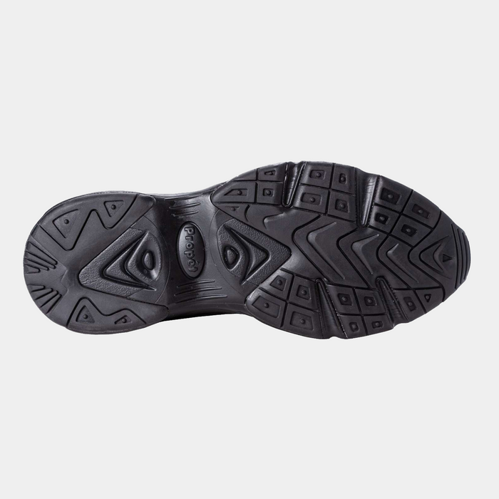 Propét Stability Walker outsole in black showing durable rubber construction with tread patterns for enhanced traction.