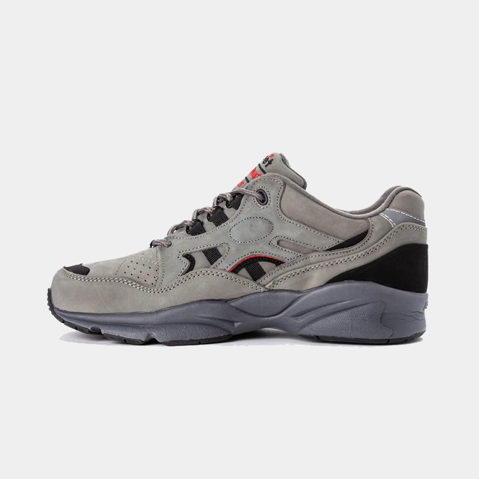 Propét Stability Walker walking shoes in gray nubuck leather with black accents and perforated details, side view.