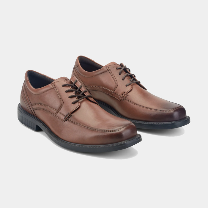 Rockport Style Leader 2 Apron Toe dress shoes in brown leather with apron-toe design and black non-slip outsole, angled front view.