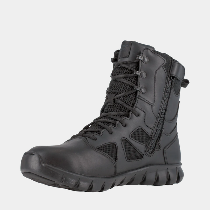 Reebok Work Sublite Cushion Tactical boots in black with mesh panels, leather accents, lace-up design, and side zip closure, front angle view.