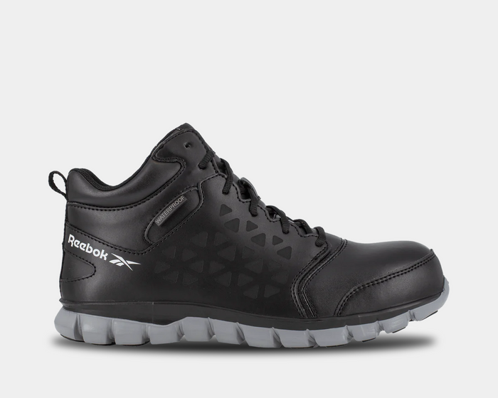 Reebok Work Sublite Cushion Waterproof Composite Toe Boots in black with durable leather upper and gray outsole, side view.