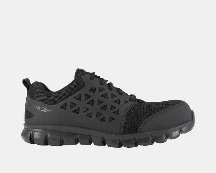 Reebok Work Sublite Cushion Work shoes in black with mesh upper, slip-resistant sole, and protective toe cap, side view.