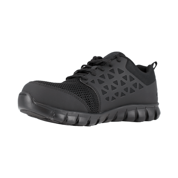 Reebok Work Sublite Cushion Work shoes in black with mesh upper, triangular cutouts, and durable slip-resistant outsole, angled front view.