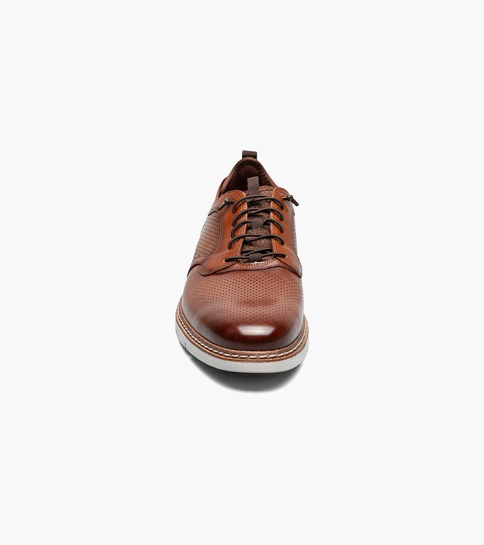 Stacy Adams Sync Plain Toe dress shoe in brown leather with perforated detailing and round toe, front view.