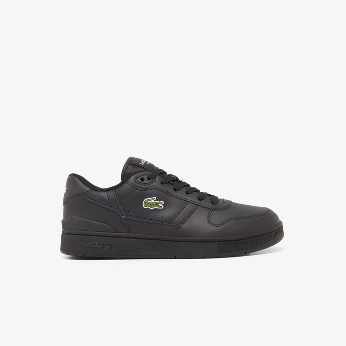 Lacoste T-Clip Set 224 2 SMA sneakers in black leather with perforated details, embroidered crocodile logo, and rubber outsole, side view.